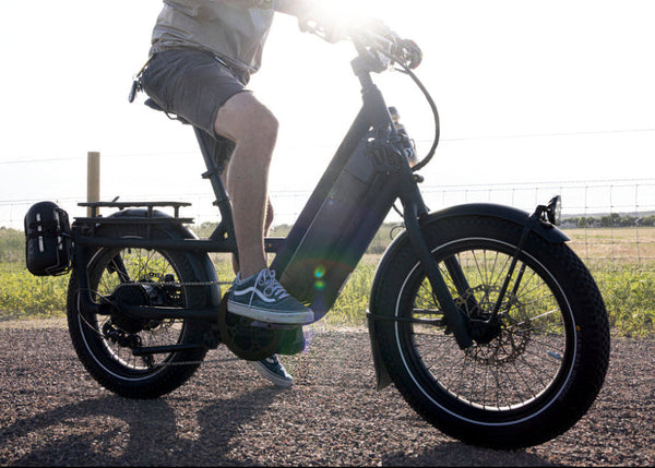 man on electric bike the pros closet